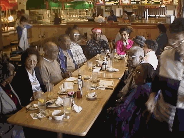 PHOTO TAKEN 20 FEB 2001

GROUP EATING AT THE GOLDEN CORAL, MOREHEAD CITY N.C.

THE MORE WE GET TOGETHER HOW HAPPY WE'LL BE